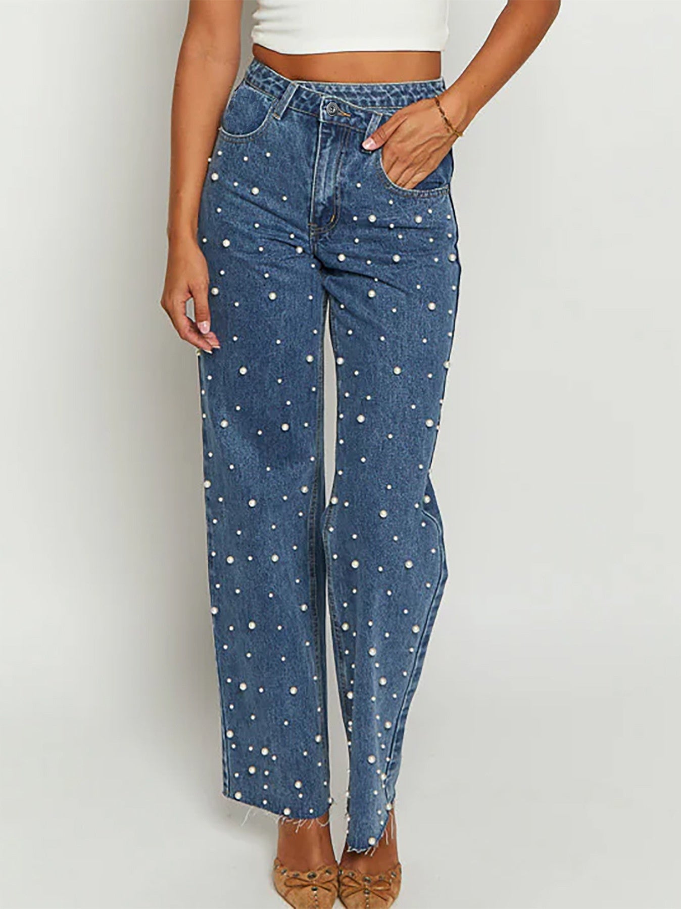 Jeans droits à ourlet effiloché avec perles croisées à taille oblique