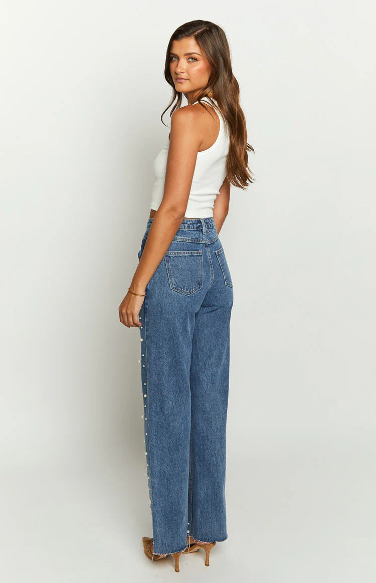 Jeans droits à ourlet effiloché avec perles croisées à taille oblique