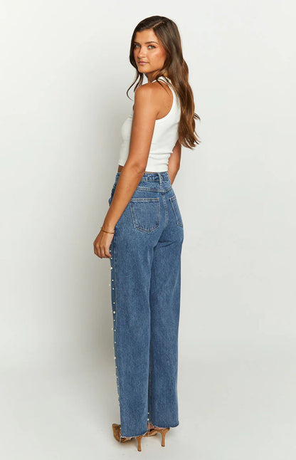 Jeans droits à ourlet effiloché avec perles croisées à taille oblique