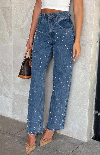Jeans droits à ourlet effiloché avec perles croisées à taille oblique