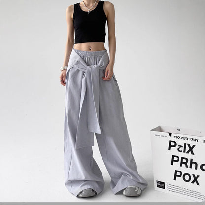 Pantalons larges à rayures à taille élastique avec un sens du design